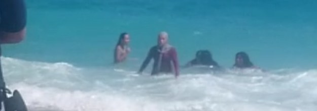 Get 'em off! Armed police order Muslim woman to remove her burkini on  packed Nice beach - as mother, 34, wearing Islamic headscarf is threatened  with pepper spray and fined in Cannes