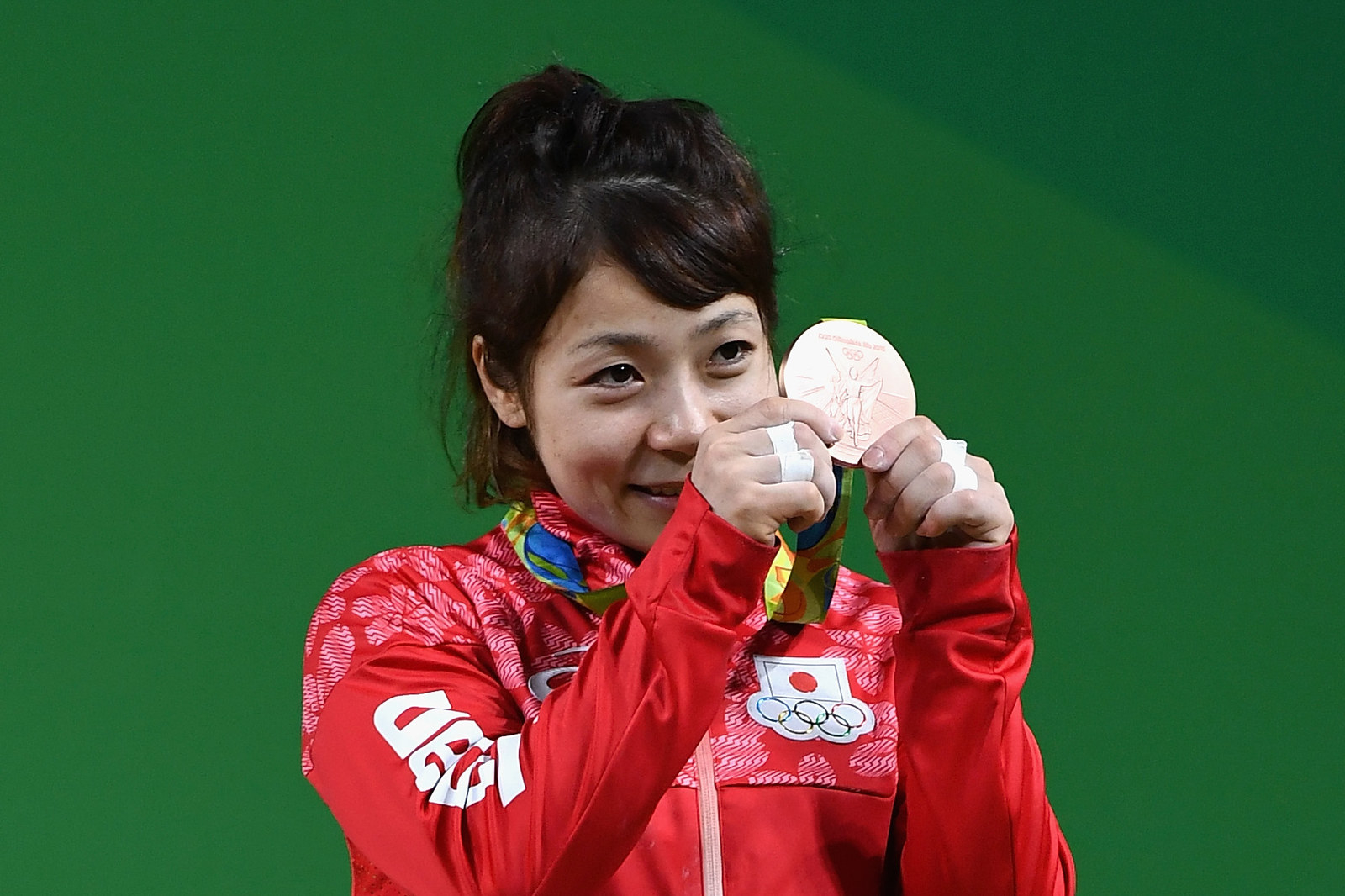RIO DE JANEIRO, BRAZIL - AUGUST 06: Hiromi Miyake of Japan celebrates after winning the bronze medal in the Women's 48kg Group A Final on Day 1 of the Rio 2016 Olympic Games at Riocentro - Pavilion 2 on August 6, 2016 in Rio de Janeiro, Brazil. (Photo by David Ramos/Getty Images)