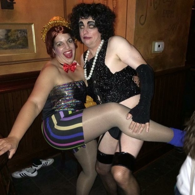 Two people dressed in revealing Columbia and Frank costumes