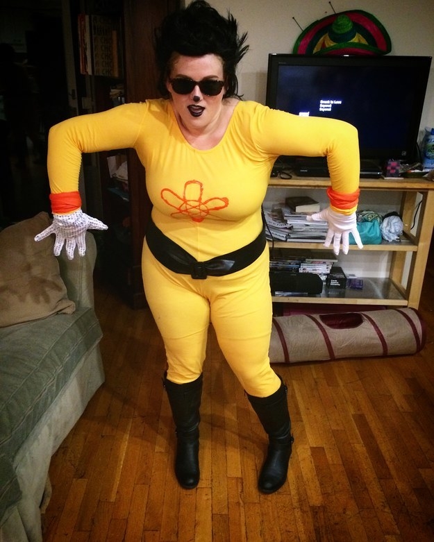 Someone in a yellow onesie dressed as Powerline