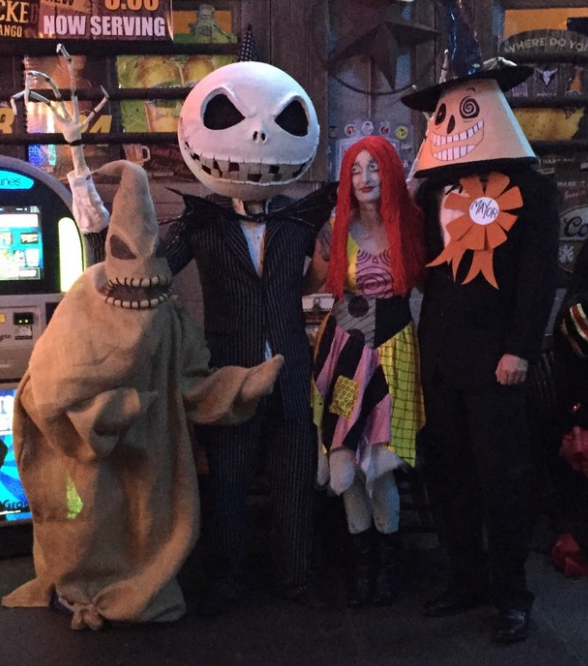 A group of people dressed in homemade &quot;Nightmare Before Christmas&quot; character outfits