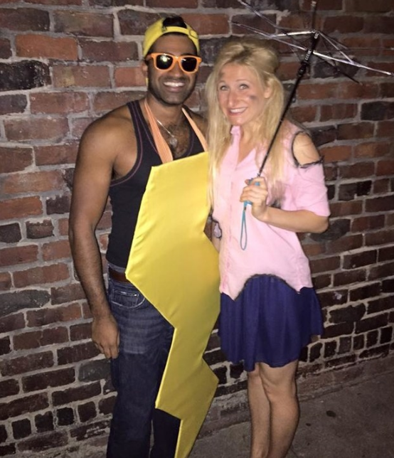 One man dressed as a lightning bolt and one girl in a pink shirt