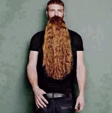 If you look closely, there is a girl standing in front of him.