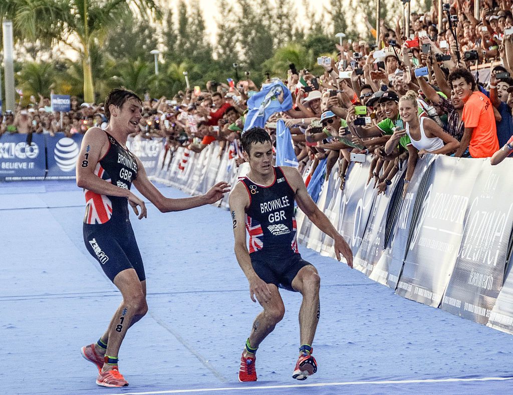 The Tan brothers train together and cross the finish line together - YP