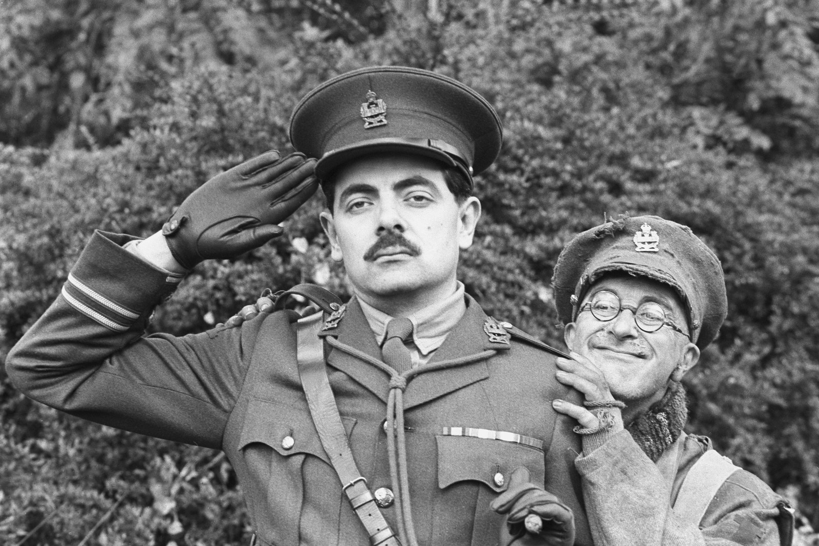 Rowan Atkinson as Captain Edmund Blackadder (left) with Tony Robinson as Private Baldrick