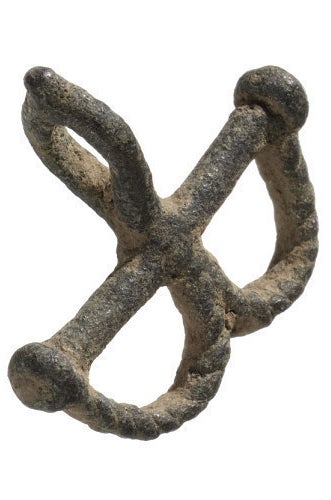 An amulet of a slave shackle.