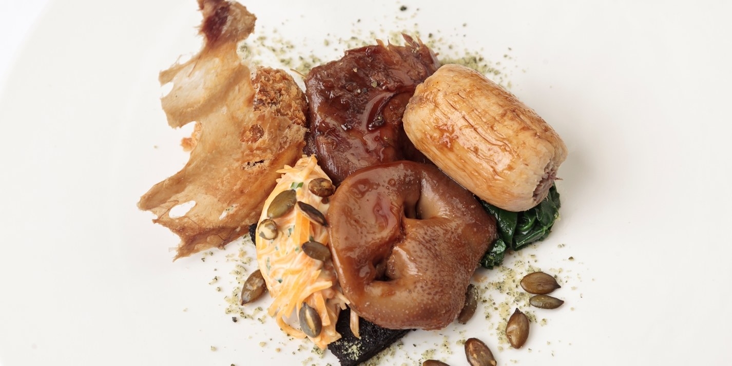 A pig’s head is braised, crumbed and fried in this rustic pig’s head recipe from Matt Gillan. Served with black pudding and a pumpkin remoulade, this hearty dish is full of robust flavours and textures to keep any meat-lover happy.