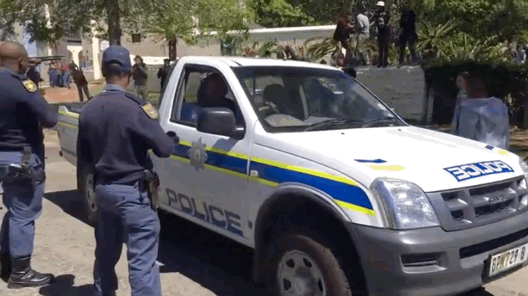 All told ten people were arrested at Rhodes University on Wednesday. Police told local media that they were under threat from students throwing rocks, which necessitated them opening fire, an explanation that students dispute.