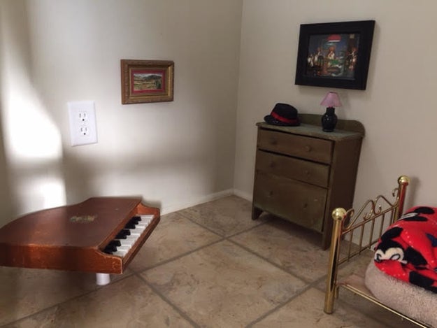 McCall sent BuzzFeed News photos of the other half of the room, which has a TINY GRAND PIANO IN THE CORNER.