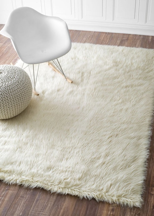 A fuzzy rug that cushions your feet if you ever dare step out of bed again.
