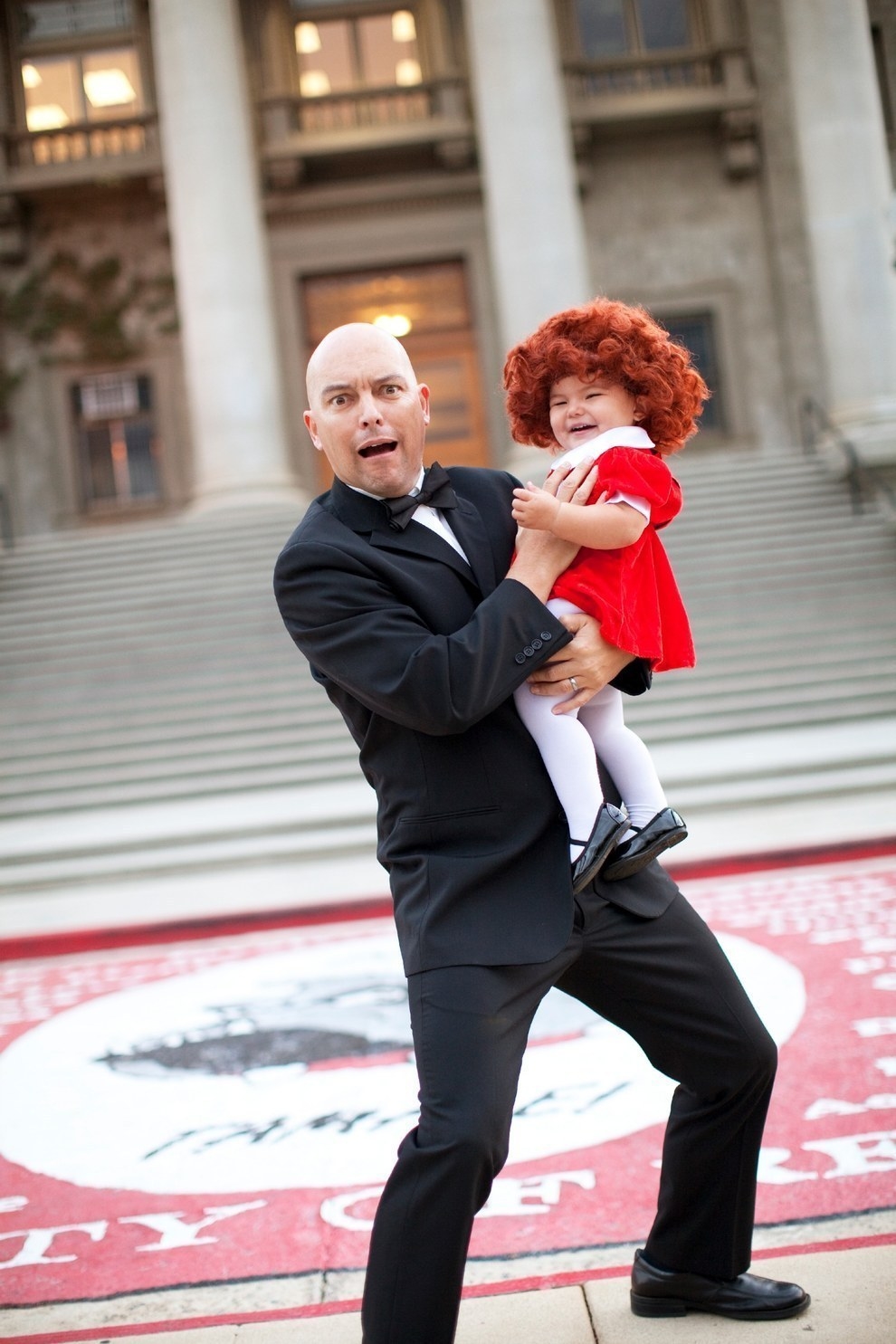 Since then she's dressed up as Annie alongside her dad, Christopher, as Daddy Warbucks...