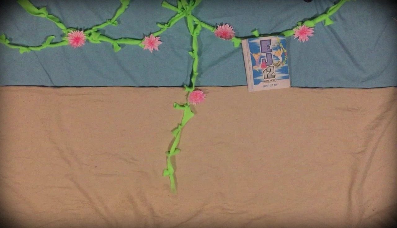 * Book #2 (Jump Start) swings past on a vine in the Amazon Rainforest