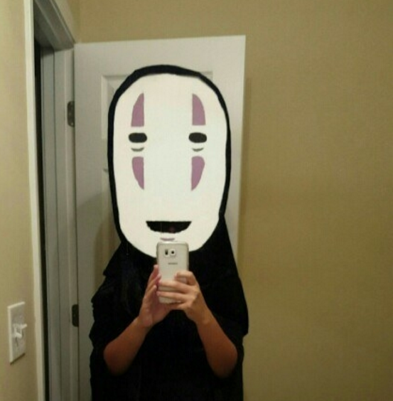 person in a big white mask