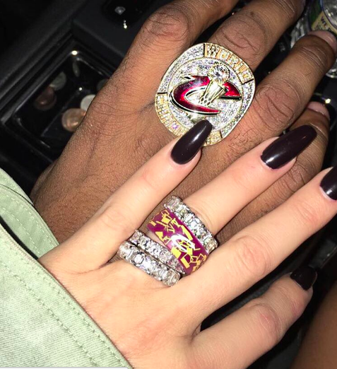 And on Wednesday, Kardashian shared this picture of herself with what appears to be Thompson's hand, captioning it with a ❤️ emoji.