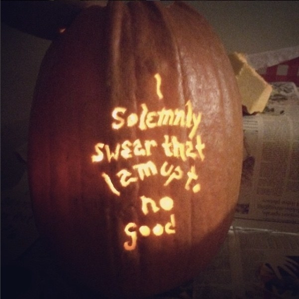 pumpkin with the carved words: &quot;I solemnly swear that I am up to no good&quot;