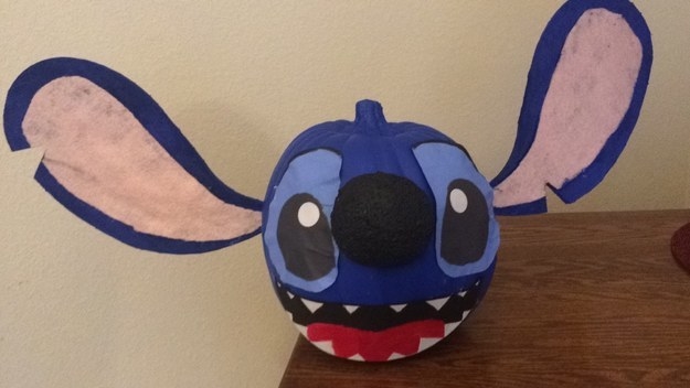 Stitch carved and painted into a pumpkin