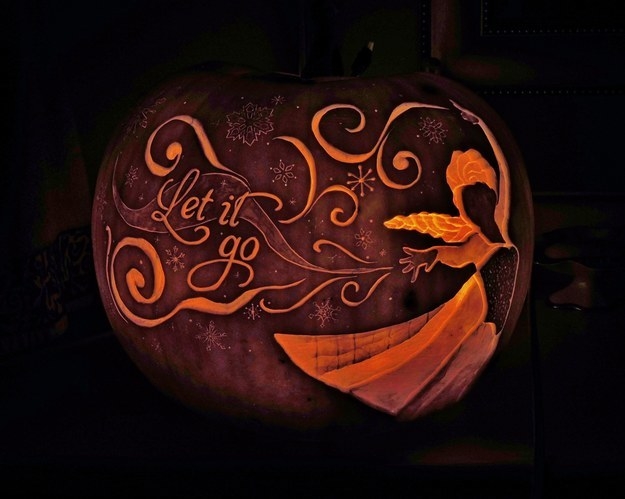 the words &quot;let it go&quot; with a decoration carved into a pumpkin