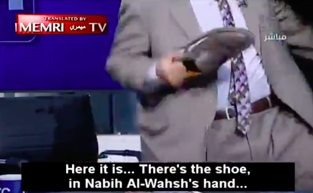 He gave a dramatic play-by-play account of the fight: "Here it is...there's the shoe..."