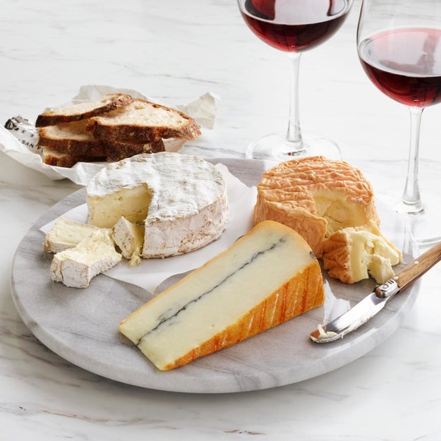 Serve cheese on a marble lazy Susan that makes the spread look pricey. And use dental floss to neatly slice your cheese.