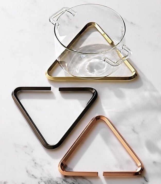 Use a set of modern trivets that double as conversation pieces to protect everyday surfaces from hot plates.