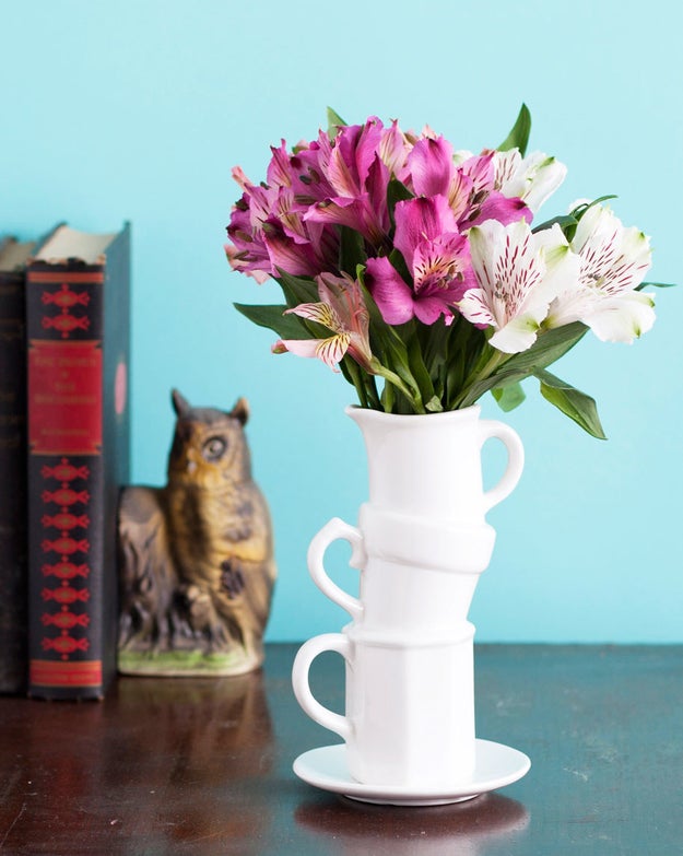 Greet guests by filling an eye-catching vase with grocery-store flowers you picked up on your party shopping haul.
