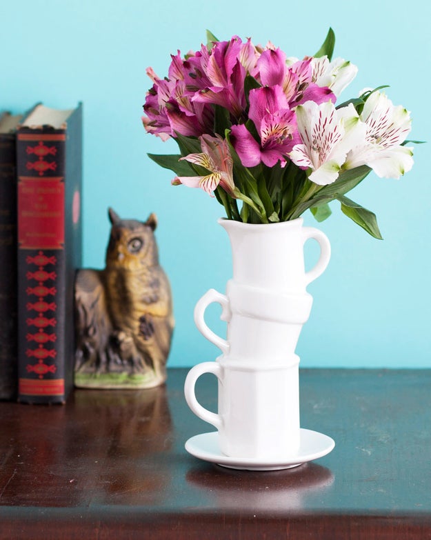 Greet guests by filling an eye-catching vase with grocery-store flowers you picked up on your party shopping haul.