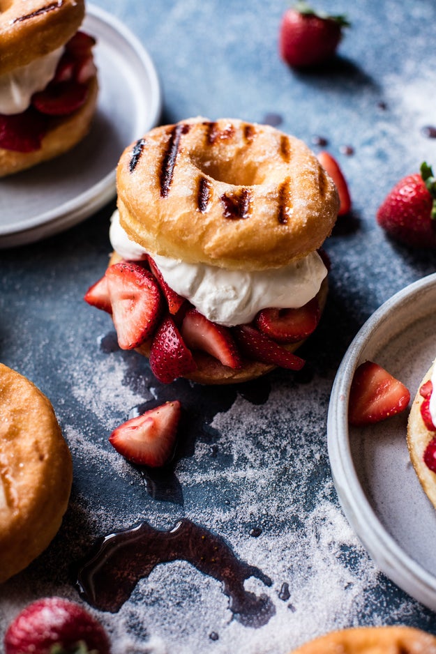 Grill up a batch of glazed brioche doughnuts and stuff them with whipped ricotta cream and fresh strawberries for a mouthwatering dessert sandwich.