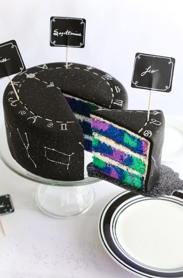 Let your inner stargazer run free and paint constellations and astrological signs onto a black cake with a secret ~galaxy swirl~ interior.