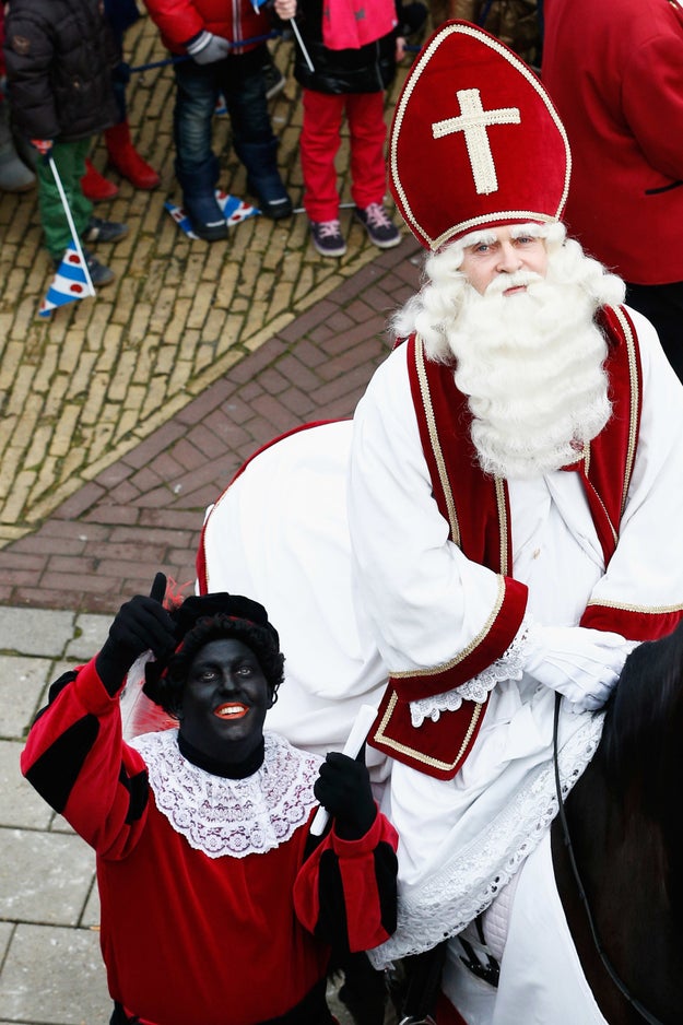 The helpers are known as "Zwarte Piet", which means "Black Pete".