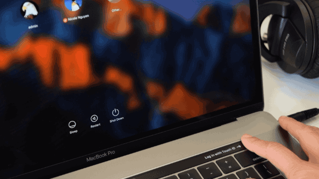 The power button that previously occupied the upper right corner has been replaced with Touch ID, Apple’s biometric fingerprint identity sensor. At first glance, it appears to be a continuation of the Touch Bar – but it’s actually a well-camouflaged physical button, which, like previous power buttons, can be long-pressed to restart your computer. With Touch ID on the Mac, you can scan your fingerprint, as you would on an iPhone, to buy stuff online with Apple Pay and !! more importantly !! unlock your computer or authenticate a Systems Preferences change. If it's a shared Mac, a user can simply rest their finger on the Touch ID button to switch accounts. It’s incredibly quick and efficient.Touch ID is a luxury reserved only for those willing to dish out $1,800 and up, which is unfortunate. (The new Pro model without the Touch Bar, at $1,499, doesn’t have it.) But I think that the prospect of a ~post-password world~ is VERY exciting.
