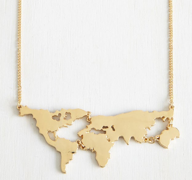 A gold necklace that somehow makes the world seem a lot smaller and more accessible.