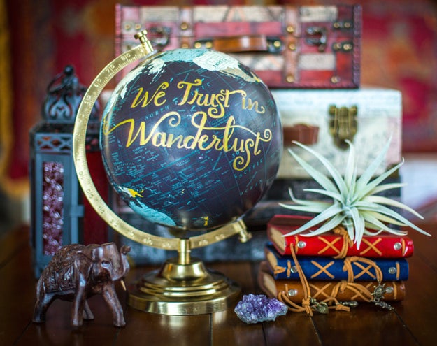 A gorgeous hand-lettered globe that knows where to place its trust (and, most importantly, rhymes).