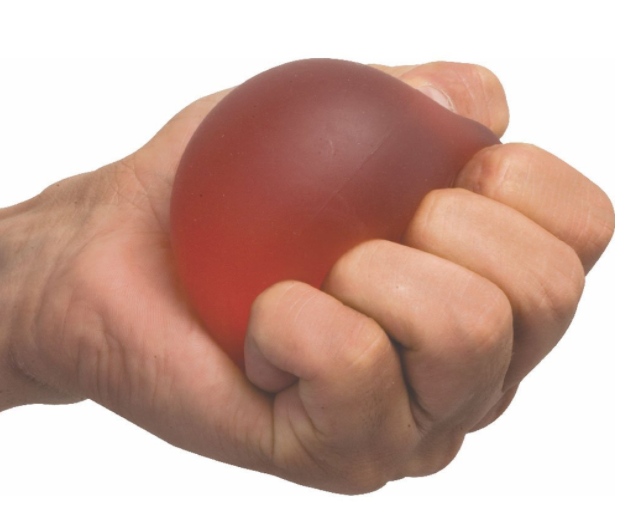 A person squeezing an exercise ball tightly in their hand
