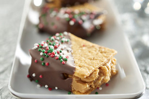 Ingredients108 WHEAT THINS Original Snacks, divided1 cup creamy peanut butter1/2 cup powdered sugar1 cup crisp rice cereal8 oz. semi-sweet baking chocolate, melted2 Tbsp. multi-colored nonpareils (green, red and white)InstructionsCRUSH 36 WHEAT THINS finely; place in medium bowl. Add peanut butter and sugar; beat with mixer until blended. Stir in cereal.SPREAD 36 of the remaining WHEAT THINS with peanut butter mixture; cover with remaining WHEAT THINS to make sandwiches, gently pressing WHEAT THINS into peanut butter mixture to secure.COVER baking sheet with parchment. Dip half of each sandwich, 1 at a time, in melted chocolate; place on prepared baking sheet. Sprinkle with nonpareils. Refrigerate 30 min. or until chocolate is firm.Fun Thoughts;With this Recipe you can always substitute the peanut butter for nutella.