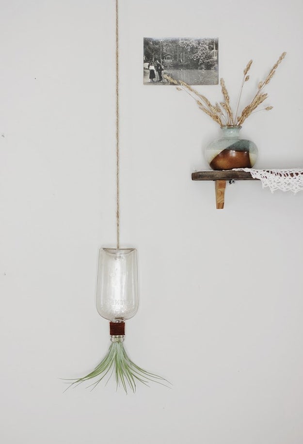 Hang 10 with an upside down bottle vase.
