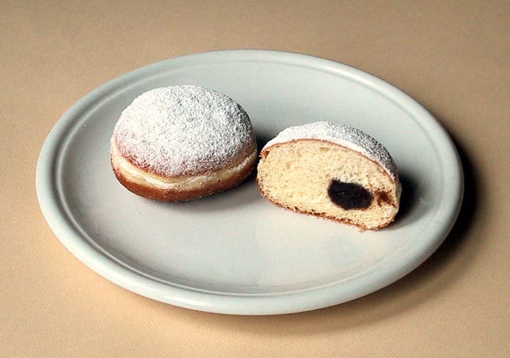 Also known as a Berliner, or Pfannkuchen, these donut style snacks, usually filled with jam, are made with a sweet yeast dough rather than batter, and are traditionally fried in lard. My arteries.