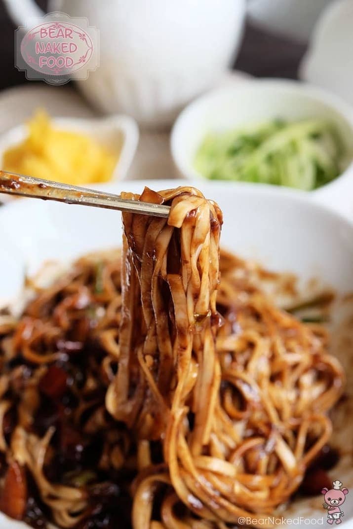 What is it? Noodles in black bean sauceChewy noodles and greasy black sauce are a match made in noodle heaven. In fact, though Chinese in origin, this dish is the most popular takeout item in Korea, and as loved among Koreans as kimchi. Recipe here.