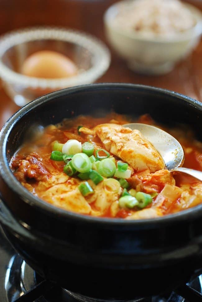 What is it? A stew made with extra soft tofu cubes. Think of this as the Korean version of late night pizza. Filled with either beef, pork, seafood, or kimchi, as well as tender tofu, this spicy dish is a go-to order to after a night of heavy drinking. Recipe here.