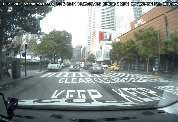 ...and here's where what appears to be an Uber self-driving car blows right past it.