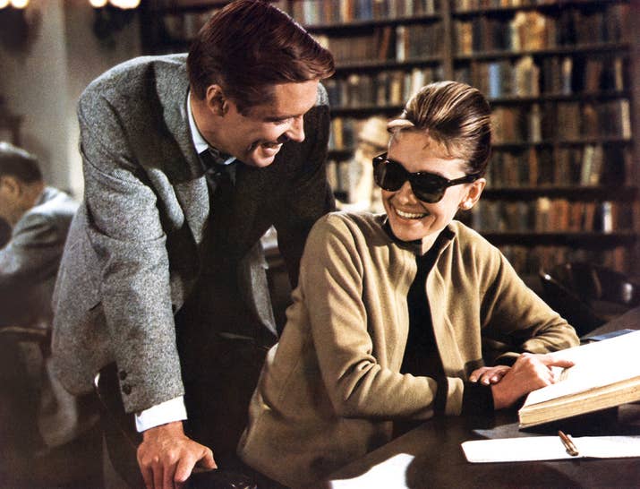 George Peppard and Audrey Hepburn on the set of Breakfast at Tiffany's, based on the novel by Truman Capote and directed by Blake Edwards.