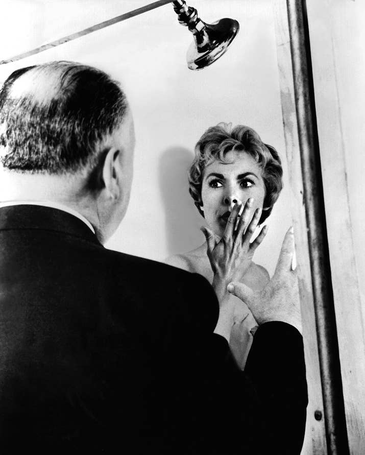 Director Alfred Hitchcock and actor Janet Leigh on the set of Psycho.