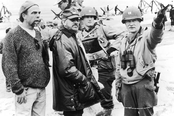 Director Steven Spielberg on the set of the film Saving Private Ryan.