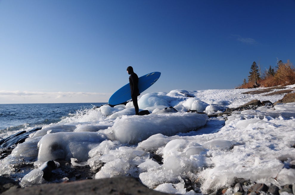 Brave the water by winter surfing...