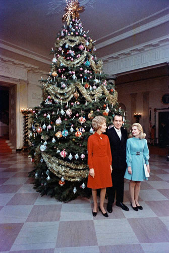 This tree is incredibly 60s and I'm sure an incredible amount of effort went into it. That doesn't stop me from being incredibly disappointed. In fact, I'd say Tricia's bright blue dress overshadows the 19-foot fir. Terrible attempt at spreading apart the ornaments, and even worse use of gold garland. And can you believe Nixon chose a tree leaning that far left?