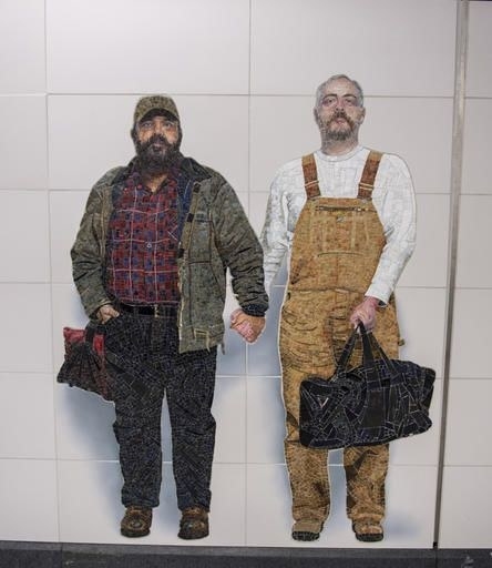 One pair of "strangers" featured is a local married couple, Thor Stockman and Patrick Kellog, who are depicted holding hands. The couple told BuzzFeed News they got involved after a friend invited them to pose for a photo at the artist's Brooklyn studio.