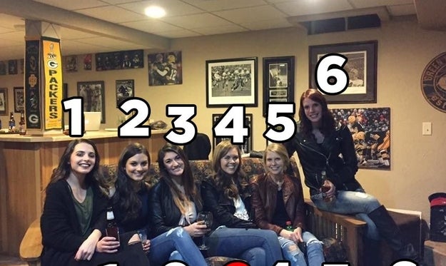 The photo seems straightforward enough until you realize that there are six women but only five pairs of legs.