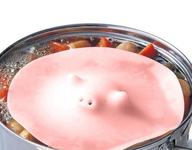 A silicone steamer in the shape of a faceless, melting pig.