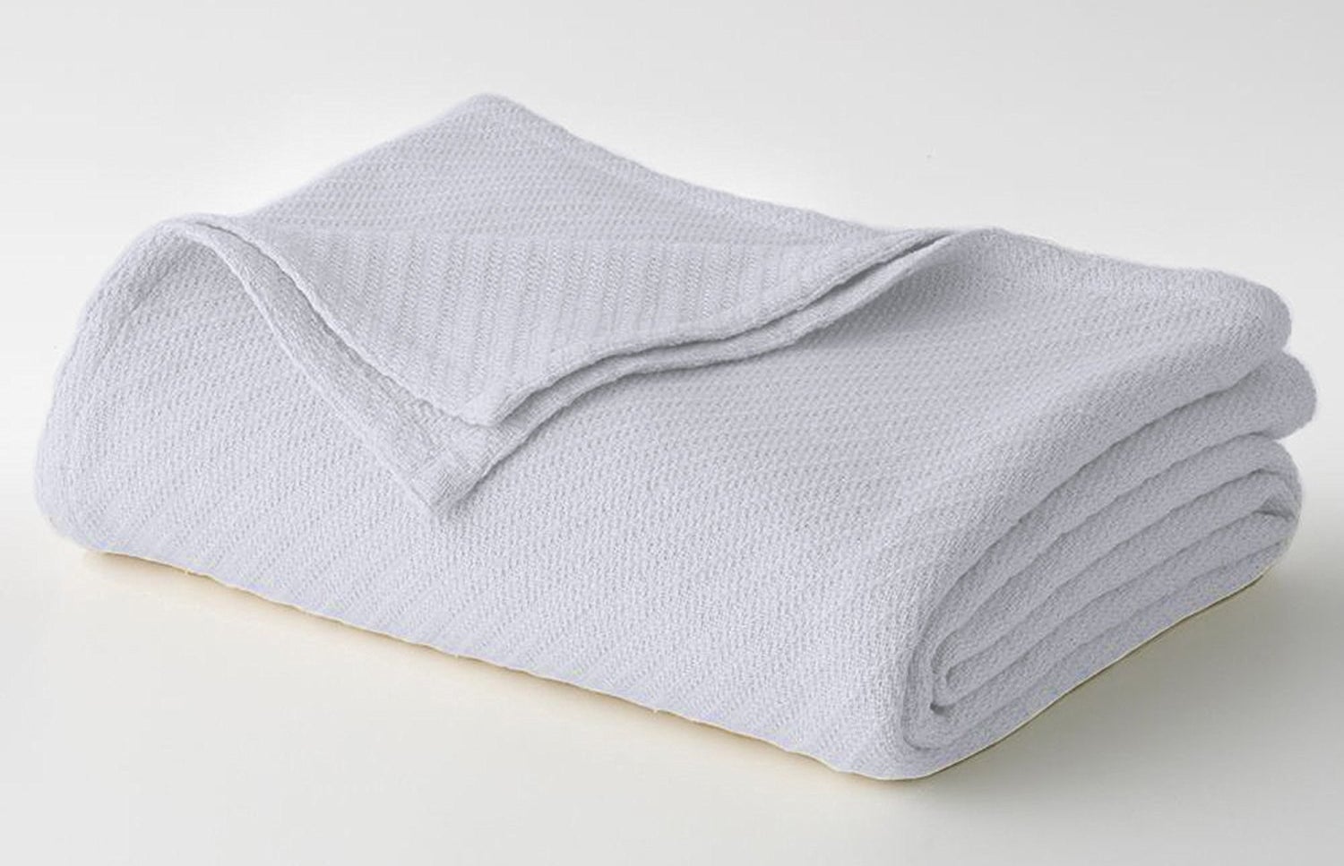 folded white blanket