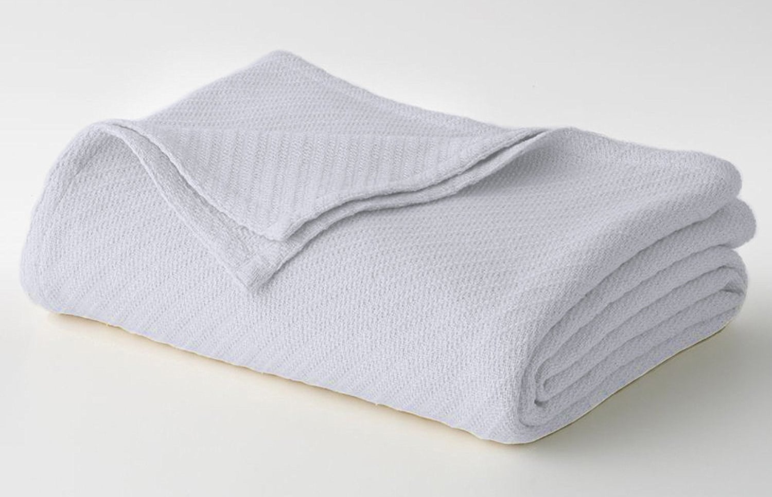 folded white blanket