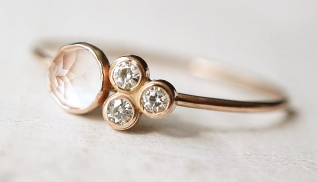 A rose quartz and moissanite ring that confirms that four is not a crowd.